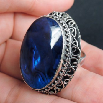 Zilveren ring blauw Abalone schelp in bewerkte setting